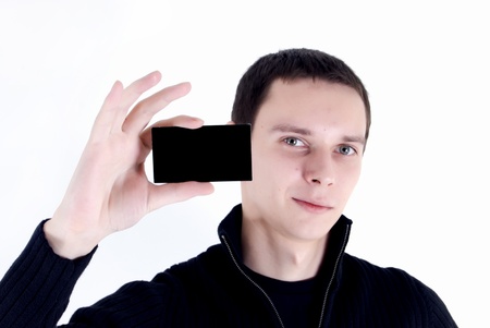 Young man disclosing his face の写真素材