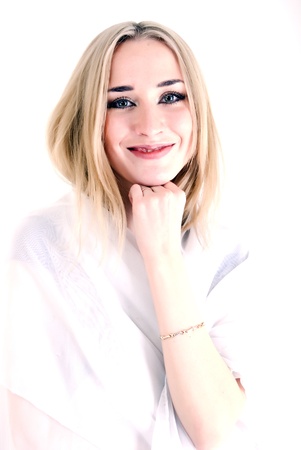 Portrait of a young beautiful blonde being happyの写真素材