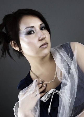 Portrait of a young fashionable brunette の写真素材