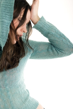 Portrait of a young brunette looking depressedの写真素材