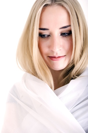 Portrait of a young seductive blonde over whiteの写真素材