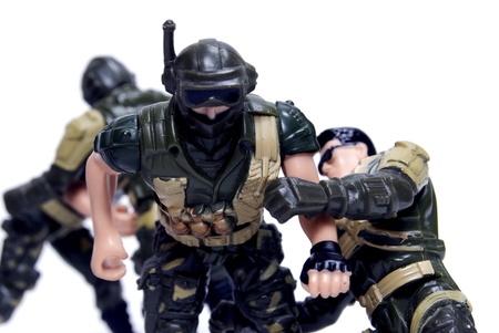 toy soldiers in camouflage  fightingの写真素材