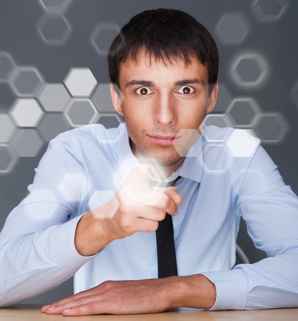 Business Man pressing digital button, futuristic technologyの写真素材