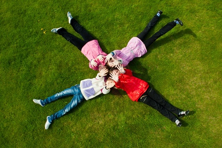 Image of funny kids playing on the grass