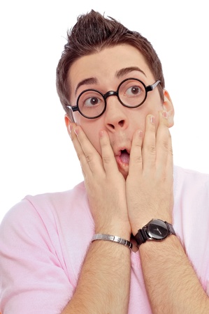View from front of man in glasses looking at camera with hands on opened mouth wearing pink glamorous clothesの写真素材