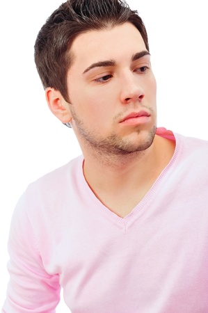 Fashion male portrait looking away deep in thought - isolated over a white backgroundの写真素材
