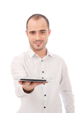 Man showing tablet computer and  smiling isolated on white background.の写真素材