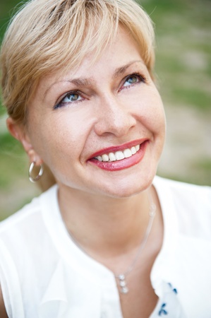 Portrait of a sexy  female smiling in a park - Outdoorの写真素材