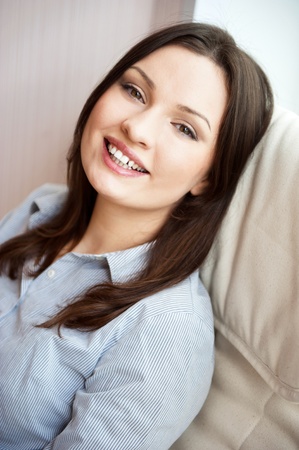 Closeup portrait of cute young business woman smilingの写真素材