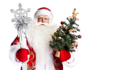 Christmas theme: Santa Claus holding christmas tree and his bag full of gifts over white backgroundの写真素材