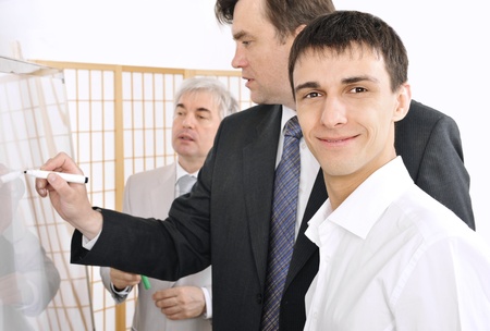 Portrait of a team planning. Office background.の写真素材