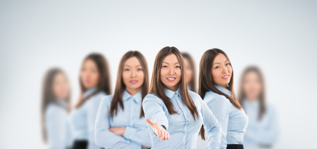Universal worker concept: beautiful asian business woman standing in diverse posesの写真素材