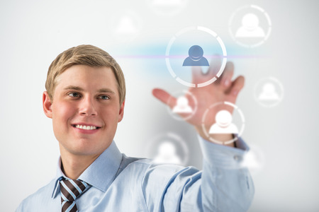 Handsome Man pressing social media iconの写真素材