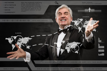 A businessman working on modern online technology on international market の写真素材