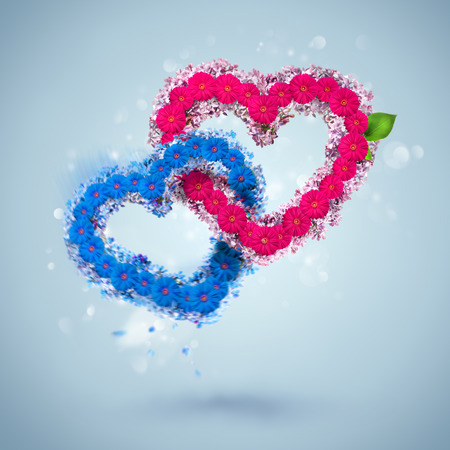 Valentine background: two hearts made of flowersの写真素材
