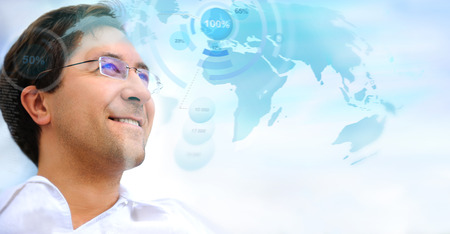 Businessman working with high tech type of modern interface on a virtual backgroundの写真素材