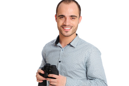 Business man with binoculars isolated on white backgroundの写真素材