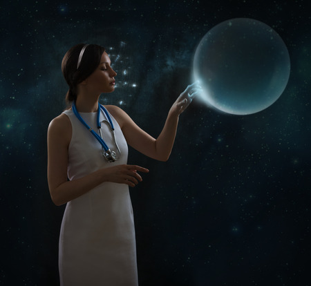 Healthcare, medical and future technology concept - female doctor with virtual interfaceの写真素材
