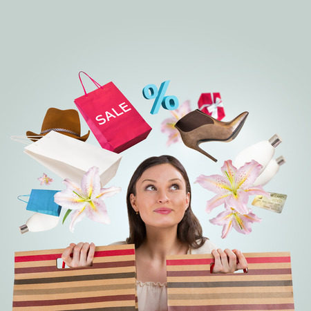 Woman shopping concept. Collage with different shopping symbols around girlの写真素材