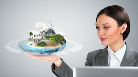 Better world project concept, Business woman presenting her ideal city projectの写真素材