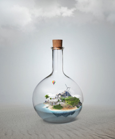 Corked glass bottle with beautiful island and sea inside. Confidence, stability, insurance conceptの写真素材