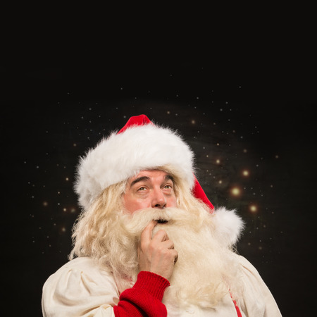 Santa Claus at night making magicの写真素材