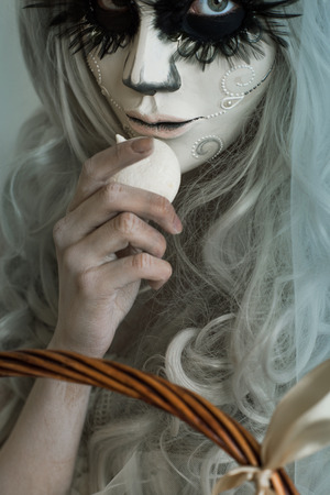 Halloween witch eating candyの写真素材