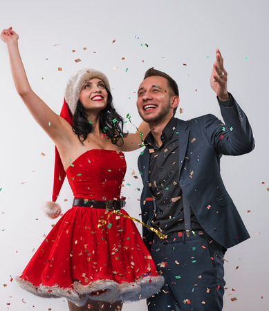 Portrait of two people man and woman in love celebrating new year eve or christmas partyの写真素材