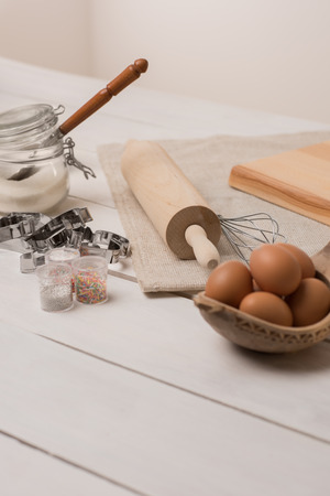 Ingredients for dough on white wooden tableの写真素材