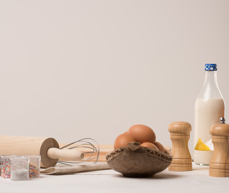 Ingredients for dough on white wooden tableの写真素材