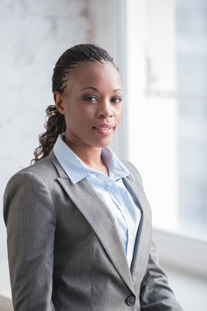 Image of pretty african businesswoman looking at cameraの写真素材