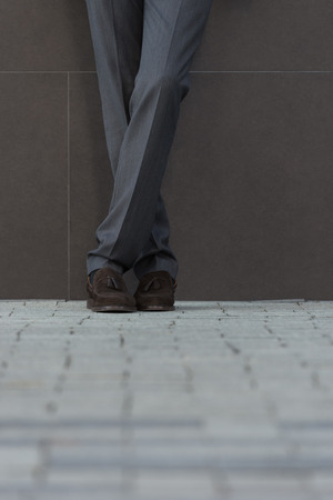 Closeup of businessman legs on the streetの写真素材