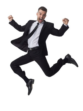 Businessman jumping full length portrait isolated on white backgroundの写真素材