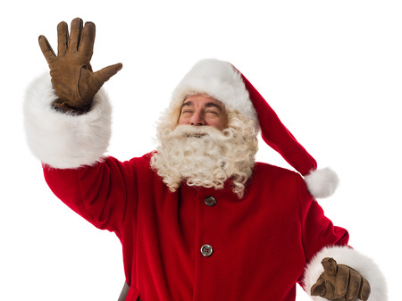 Santa Claus working with virtual interface or waving his hand. Portrait Isolated on White Backgroundの写真素材