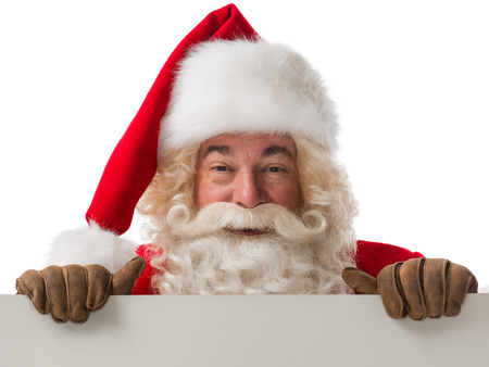 Santa Claus holding copyspace blank sign. Portrait Isolated on White Backgroundの写真素材