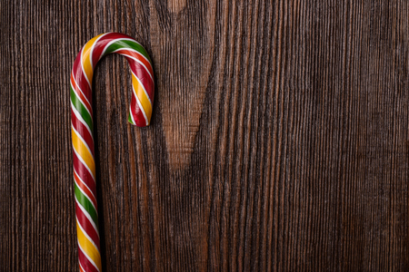 Christmas Candy Cane on wooden backgroundの写真素材