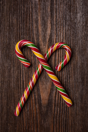 Christmas Candy Cane on wooden backgroundの写真素材