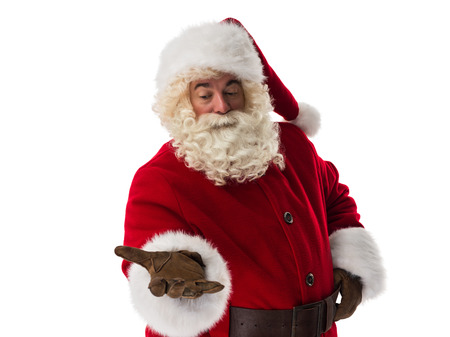 Santa Claus presenting new product Closeup Portraitの写真素材
