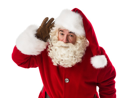 Santa Claus holding hand near ear Closeup Portraitの写真素材