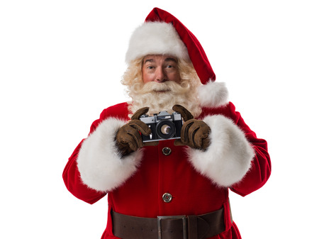 Santa Claus holding vintage camera Closeup Portrait. Isolated on White Background