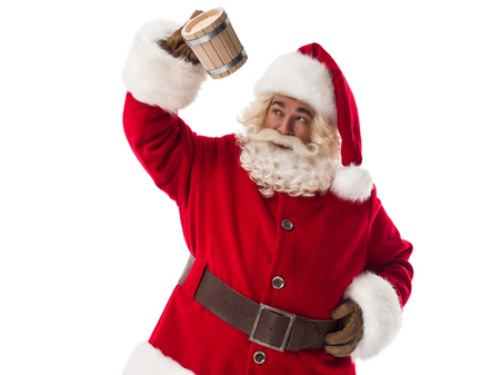 Santa Claus drinking beer Closeup Portrait Isolated on White Backgroundの写真素材