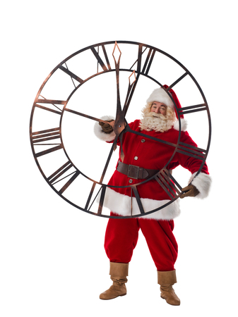 Santa Claus posing with big watches Full Length Portrait Isolated on White Backgroundの写真素材