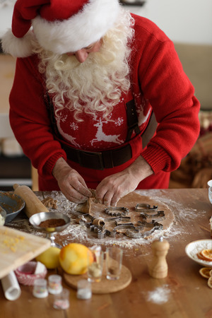 Santa Claus Cooking at Home Christmas Cookiesの写真素材