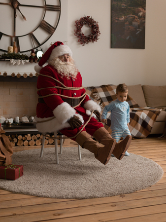 Santa Claus Playing at Home with Childの写真素材