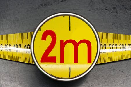 tape measure of two meters for social distancing rule during covid19 pandemicの写真素材