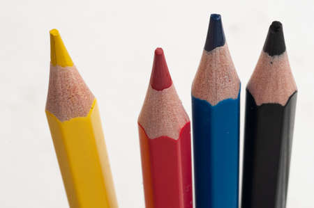 Yellow red blue and black pencils as a photographer color palette in shooting and post-production arrangementsの写真素材