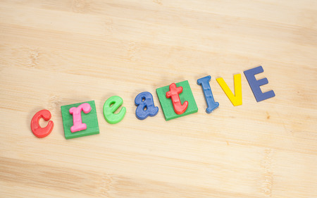 creative word  on wooden background .の写真素材