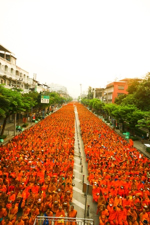 Bangkok, Thailand - March 25, 2012: Monks are participating in a Mass Alms Giving over of 22,600 monks in Wongwian Yai, Ladya Road  for the Makha Bucha celebrations in Bangkok, Thailandのeditorial素材