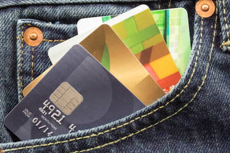 credit cards in blue jeans pocket