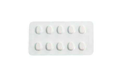 Medical pills in medical blister packs isolated on white background with work path